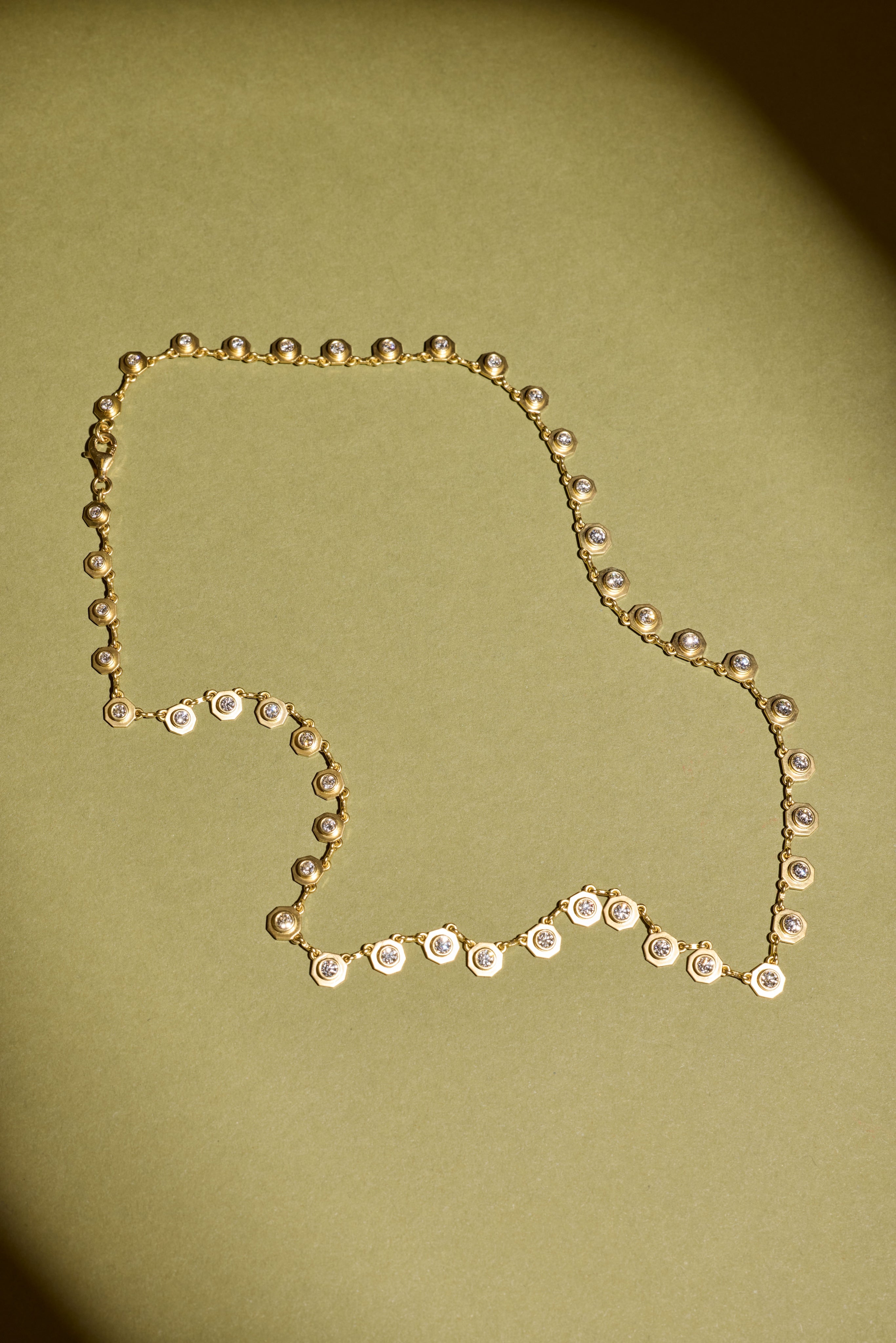 Modern relics shaped in gold, memory, and time.